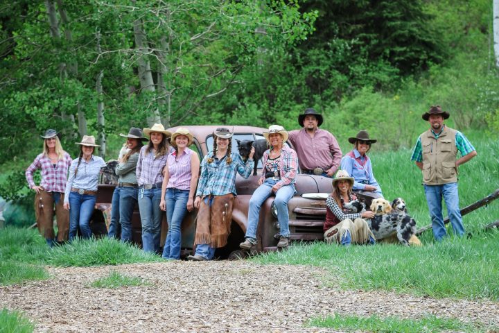 a group of people sitting at a park