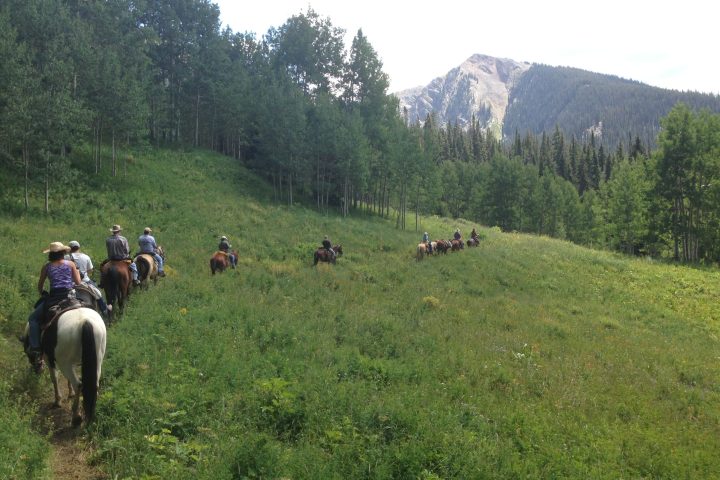 Horseback Ride family at Bearcat Stables Vail Colorado