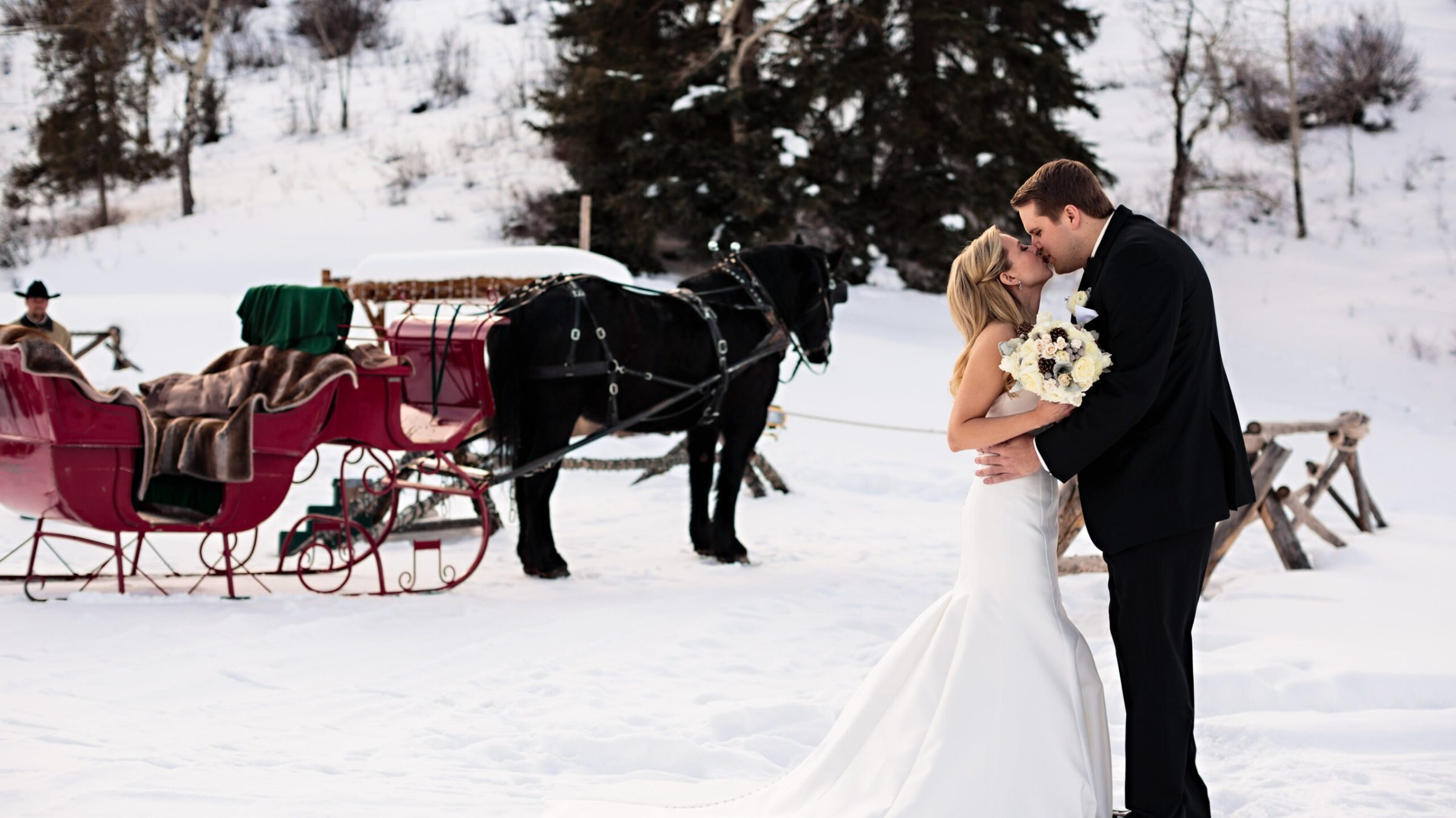 a person riding a horse in the snow